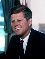 -John_F._Kennedy,_White_House_color_photo_portrait.jpg